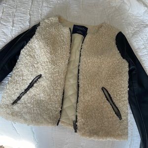 Black and white puffy/leather jacket